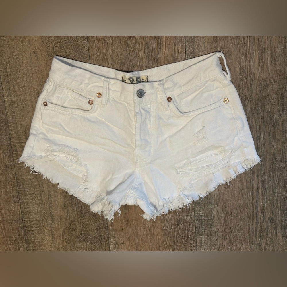 Free people white distressed shorts